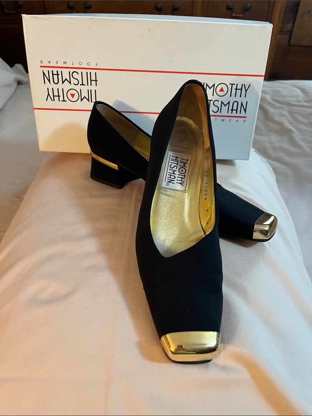 Ladies black suede square toe heels with gold accents